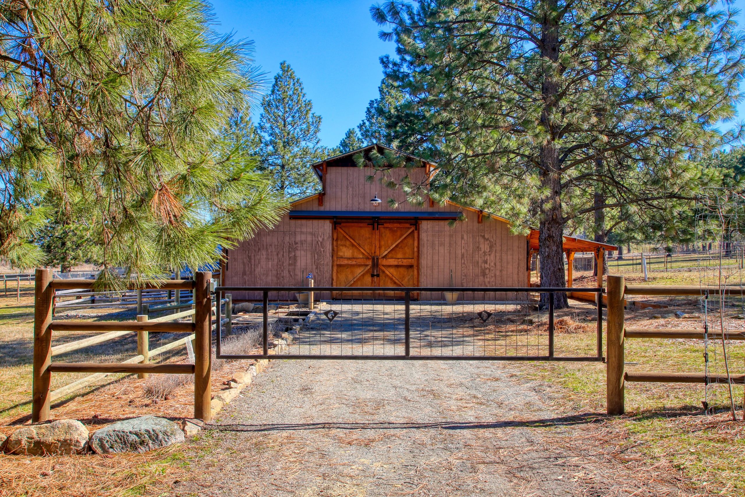 Barn in Summer with custom gate